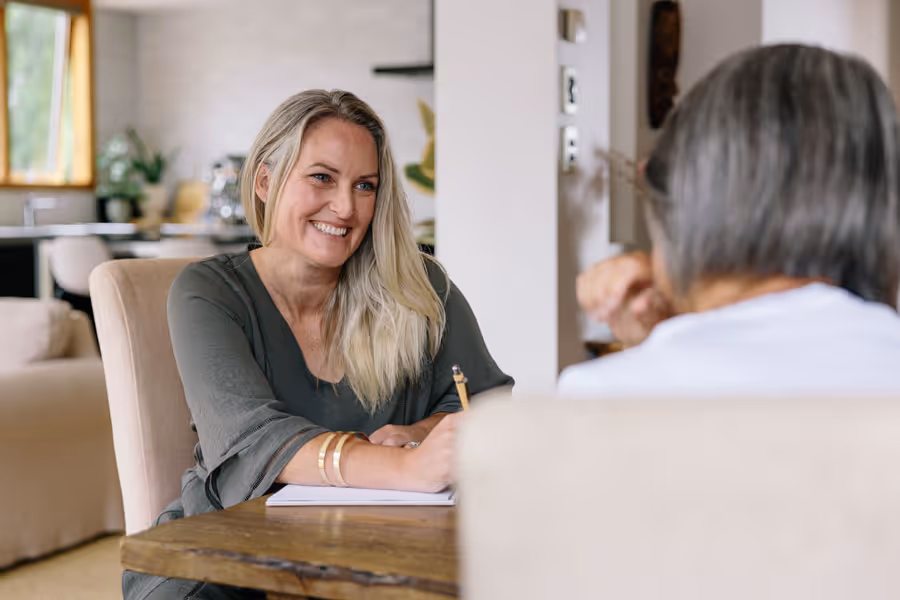 Erin meeting with a client. 