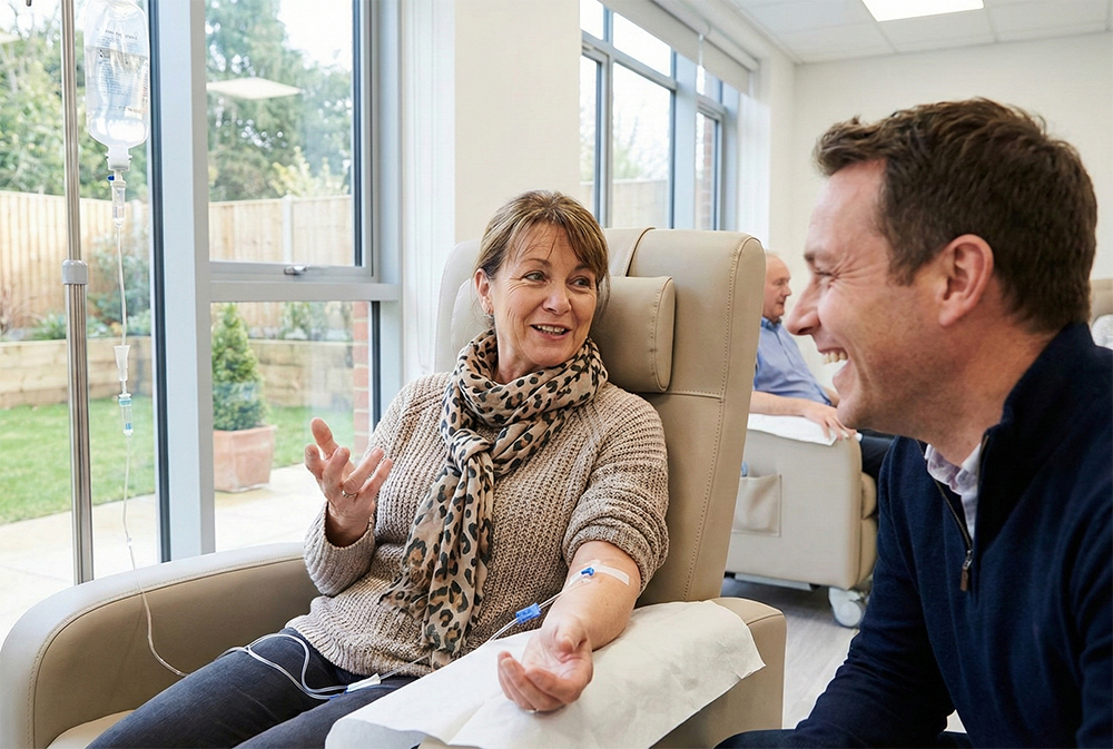 People walking through a bright hallway with wooden floor and neutral decor.