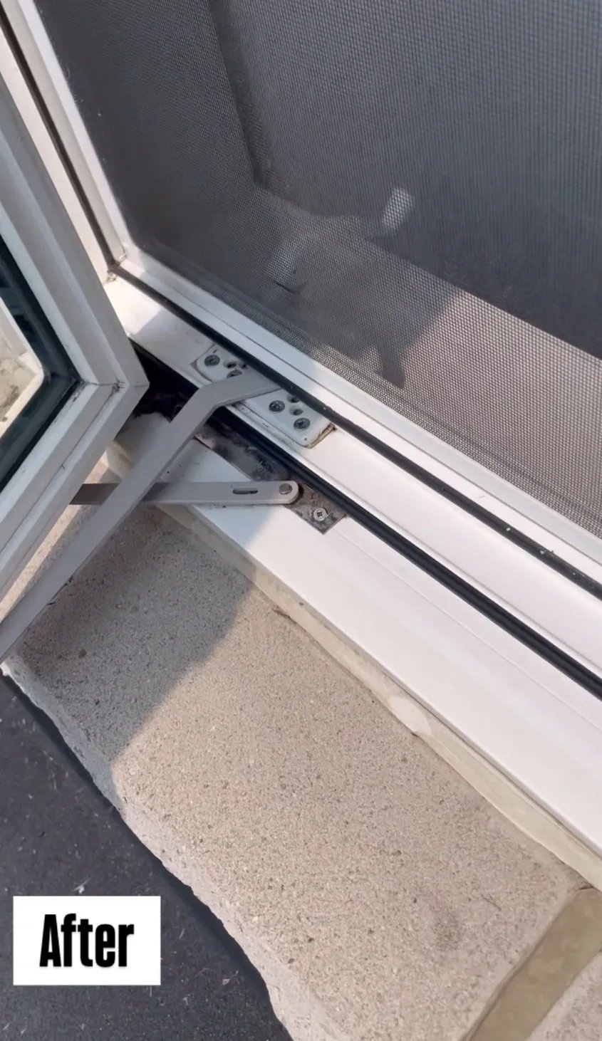 Open white window with a clean stone windowsill and a window screen visible behind the glass, labeled 'After'.
