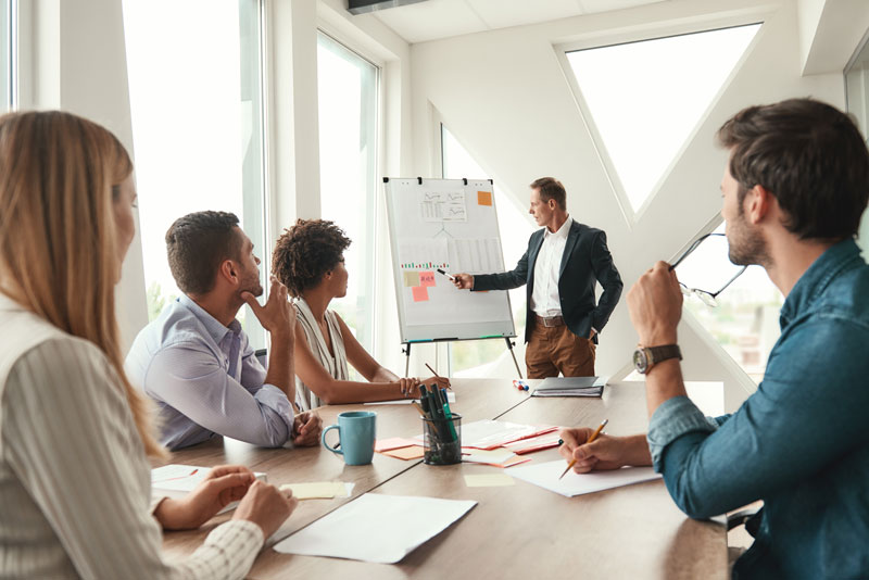 image of a diverse team in a meeting (for a edtech)