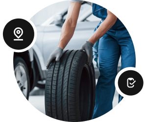 Employee holding a tire