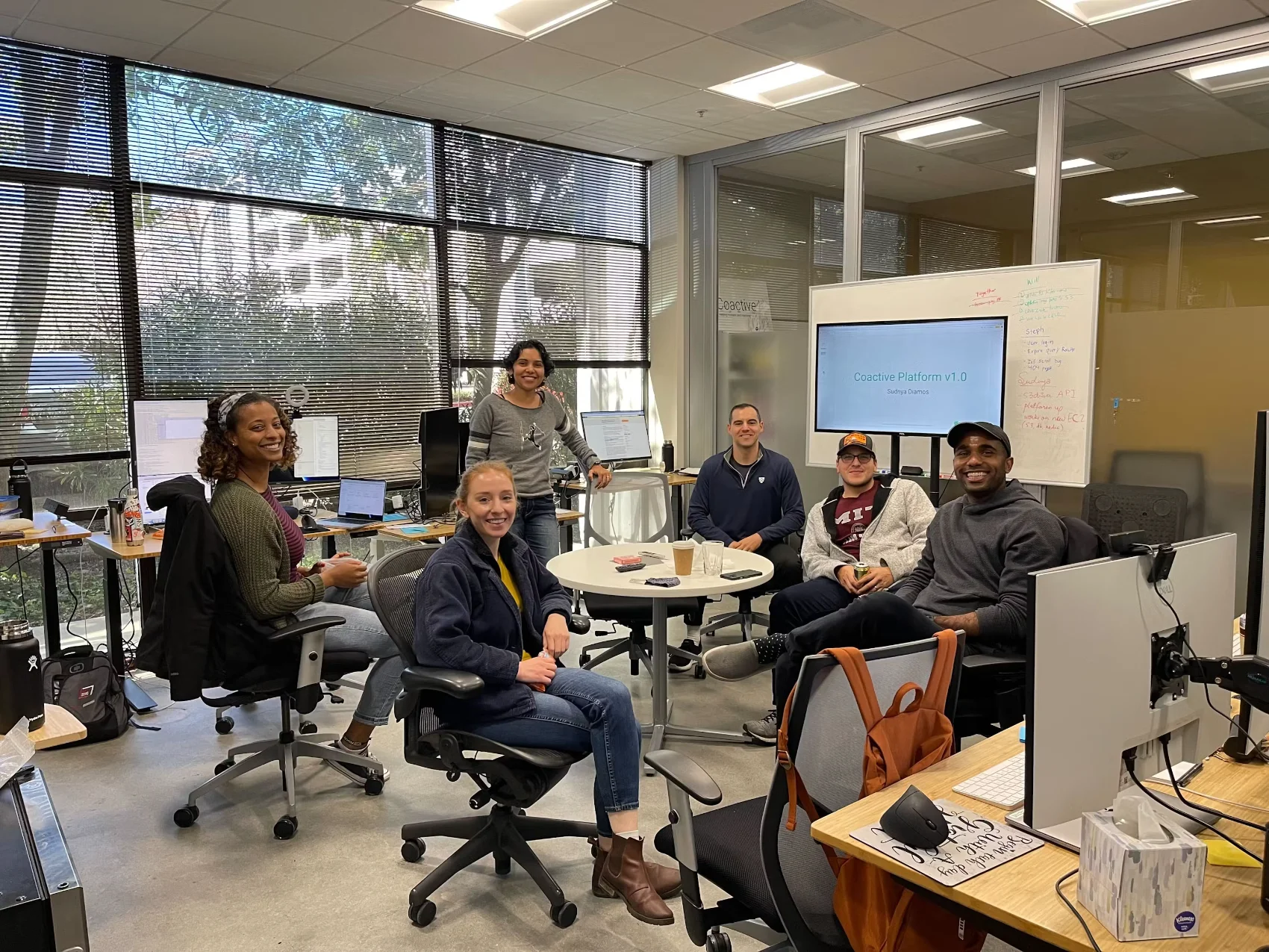Coactive team members working together in the office