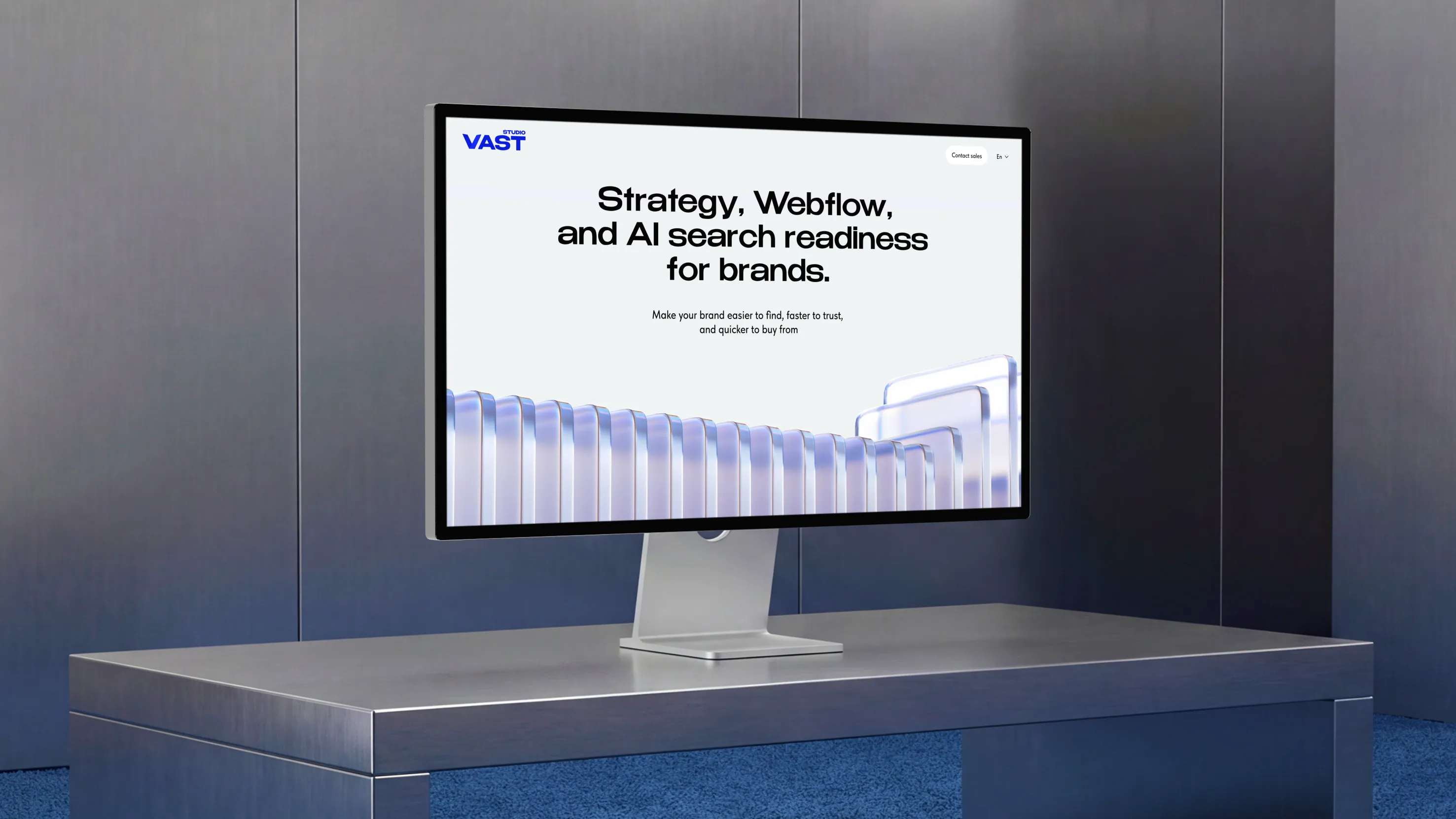 Computer screen on desk showing text about strategy, Webflow, and AI search readiness for brands.