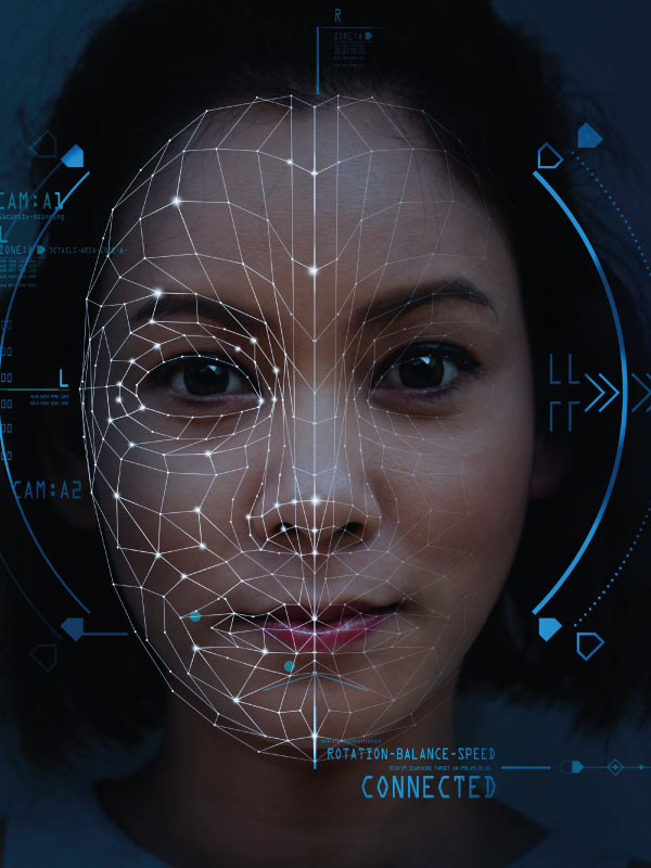 Close-up of a woman’s face with a digital facial recognition grid overlay and blue biometric scanning indicators.