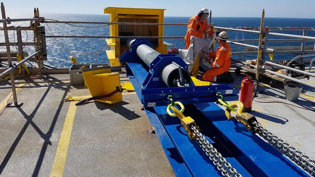 Cable riser protection frame installation 