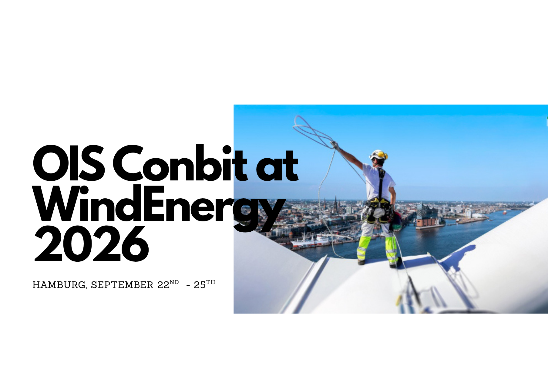 Worker on windturbine overlooking city and water