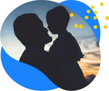 photograph of a young father holding his newborn