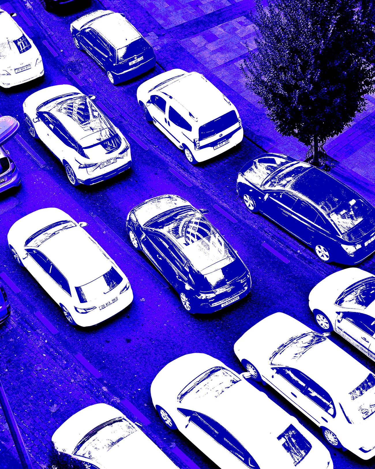 Aerial view of cars in urban traffic.