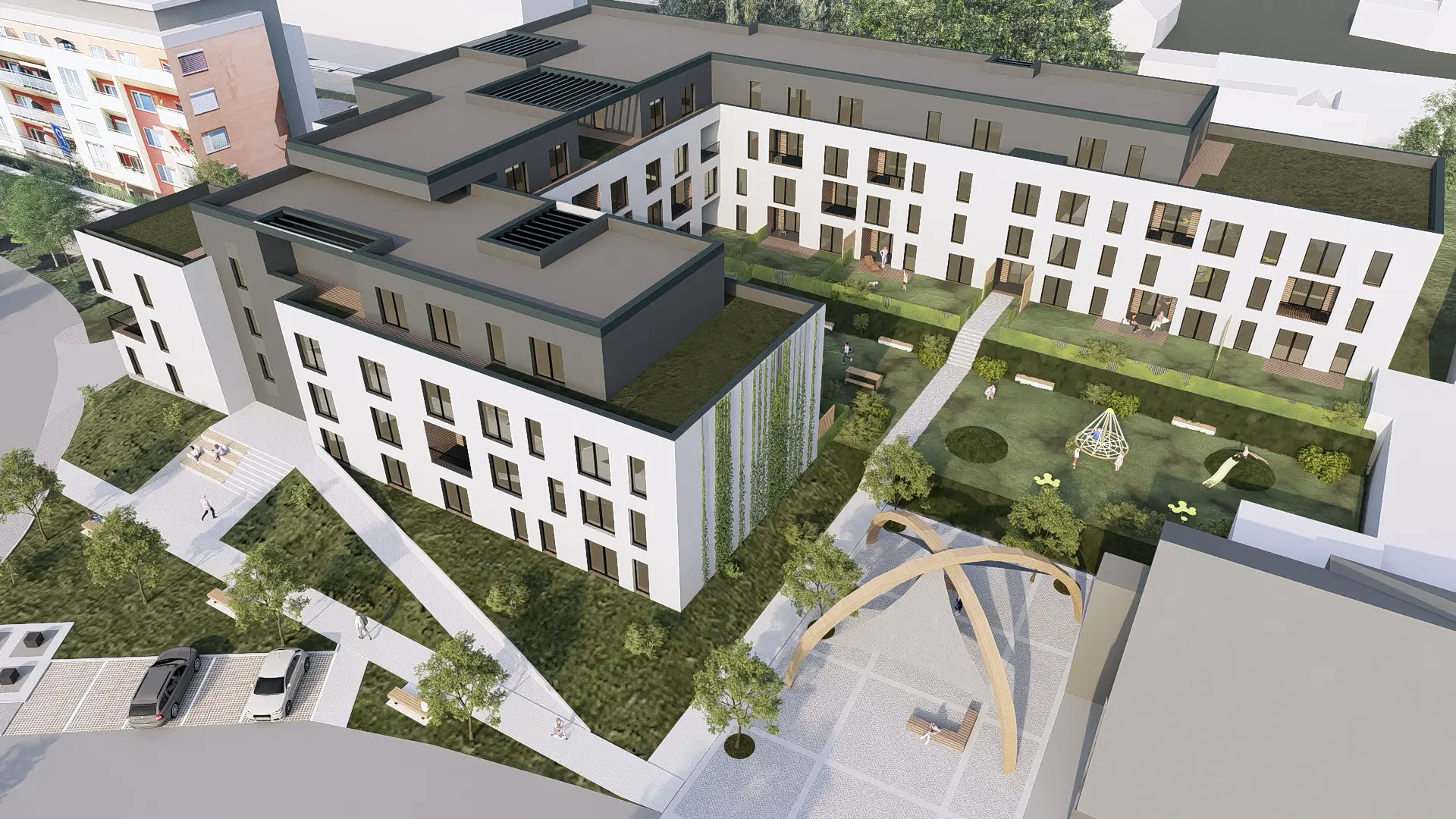 Architektonická vizualizace obytného souboru s dětským hřištěm.