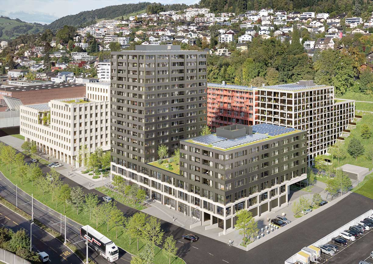 Modern mixed-use buildings with solar panels on roofs, surrounded by greenery and residential houses on a hillside.