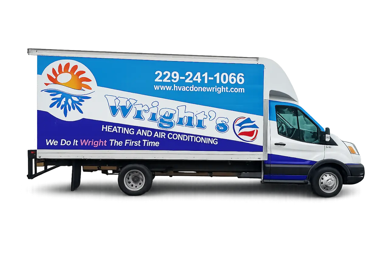 White and blue service truck for Wright's Heating and Air Conditioning with contact number 229-241-1066 and website hvacdonewright.com.