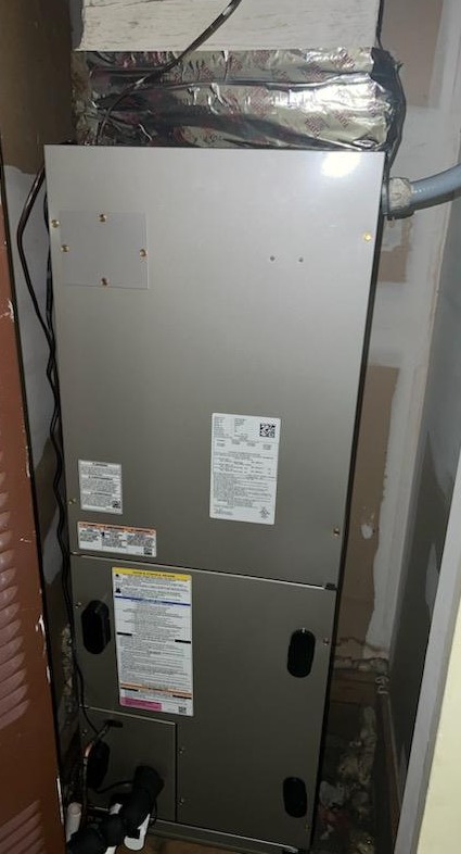 Professional furnace installation in Valdosta GA with new indoor HVAC system setup.