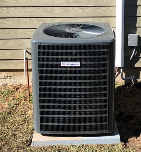 Outdoor HVAC condenser unit installation by HVAC contractor in Dasher, GA.