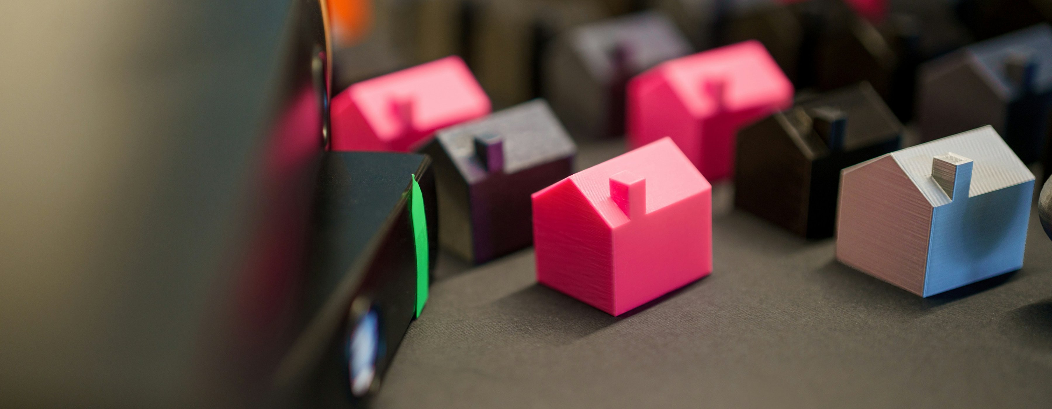 Property pricing strategy — miniature houses with valuation documents