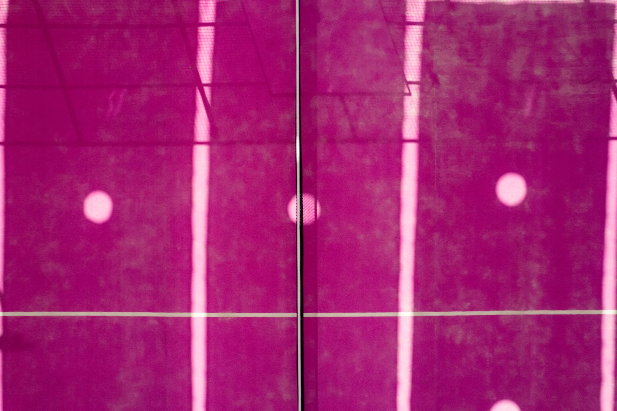 Aerial view of pink padel courts in Azur