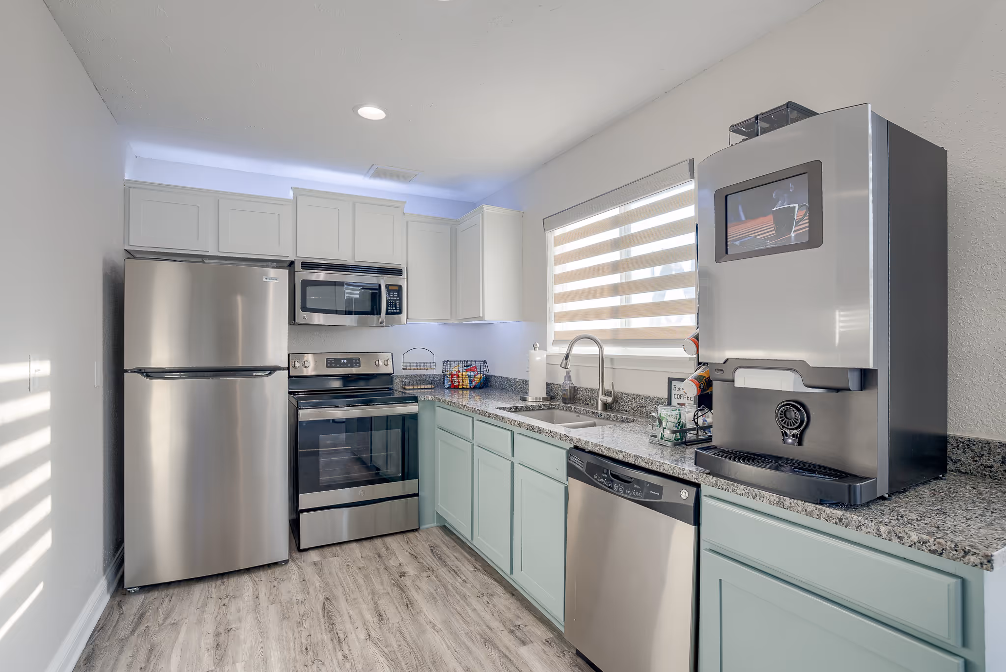 Clubhouse kitchen with white cabinets