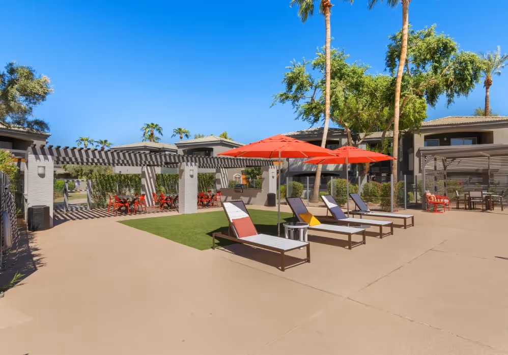 Outdoor patio with red chairs