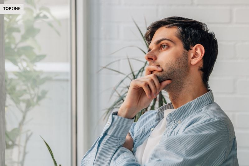 Trader thinking deeply while planning effective forex trading strategies