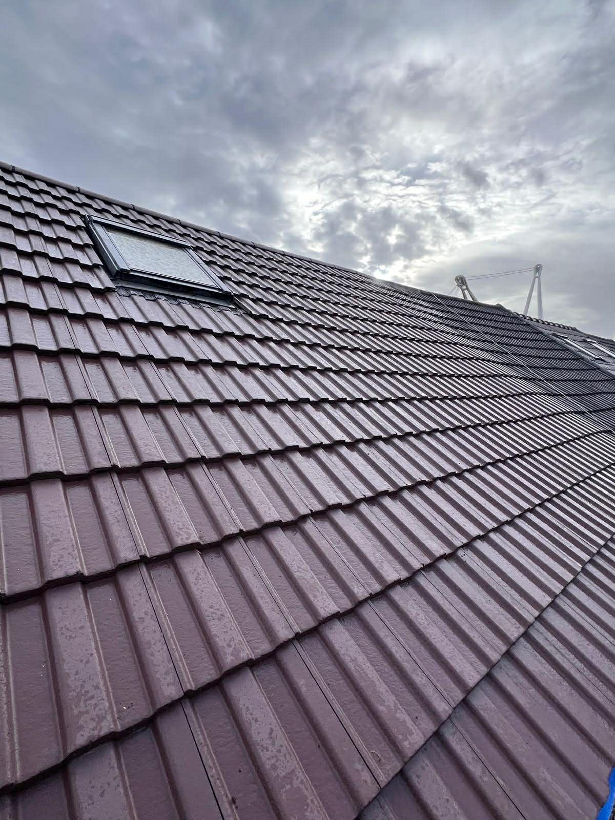 image of roofing contractor at work