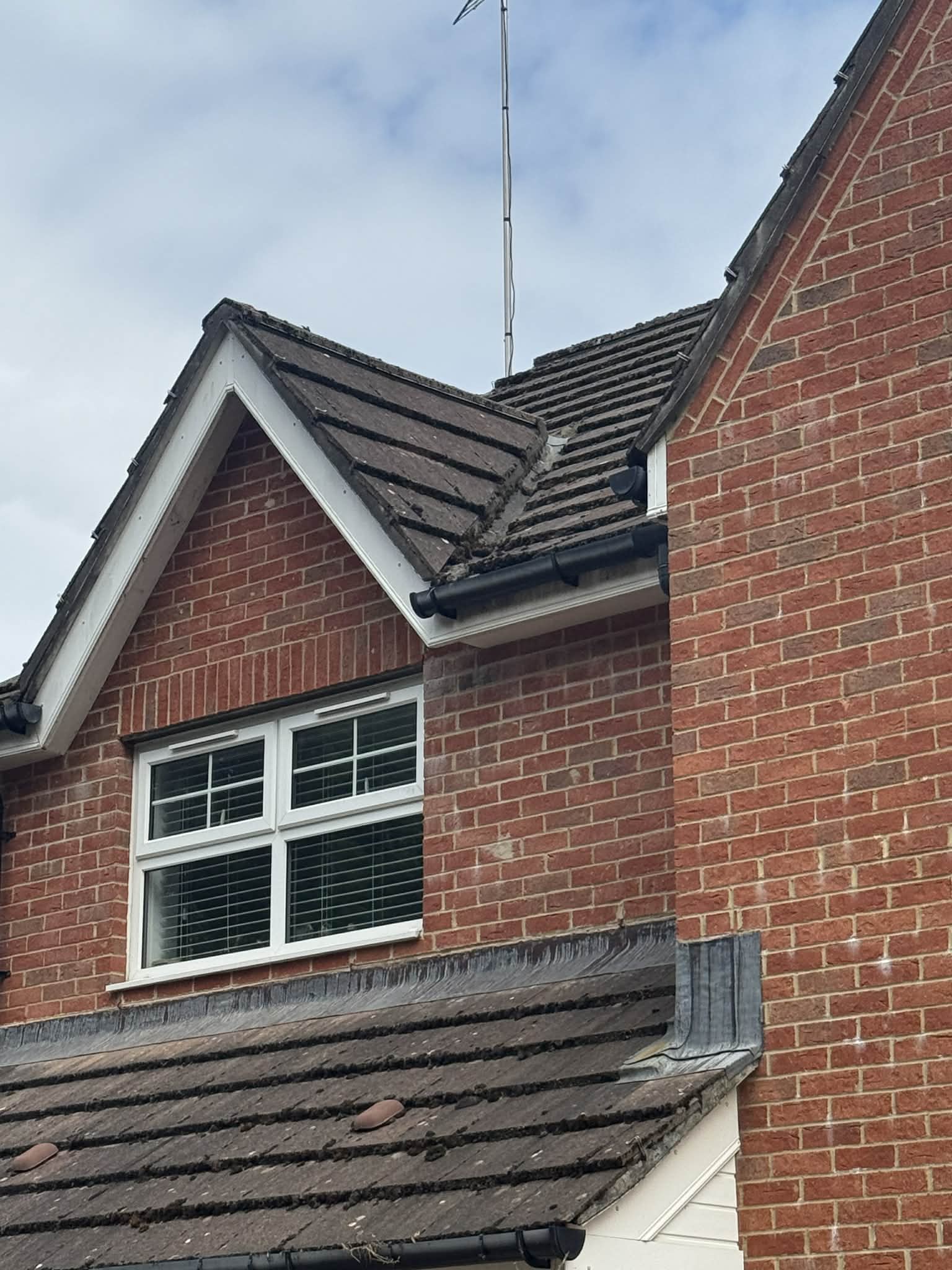 image of roofing contractor at work