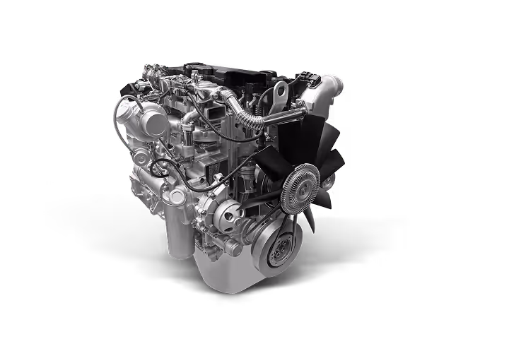 Detailed silver car engine with a black cooling fan against a black background.