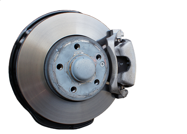 A close up of a disk rotor and caliper