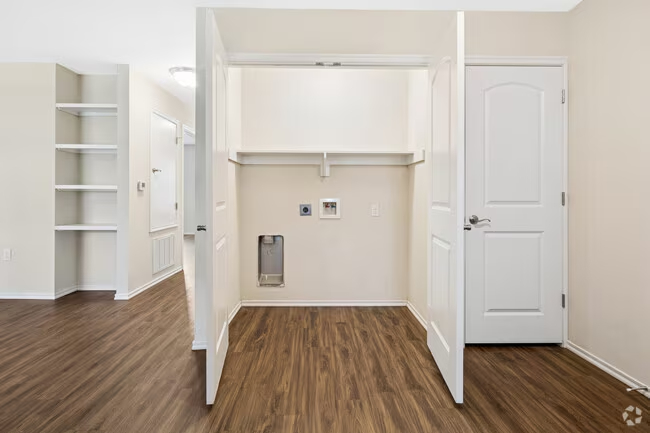 Laundry room with washer and dryer hook ups