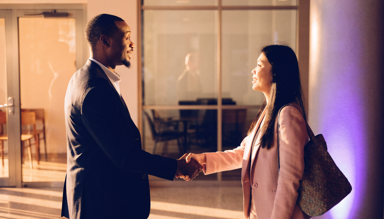 Two professionals shaking hands