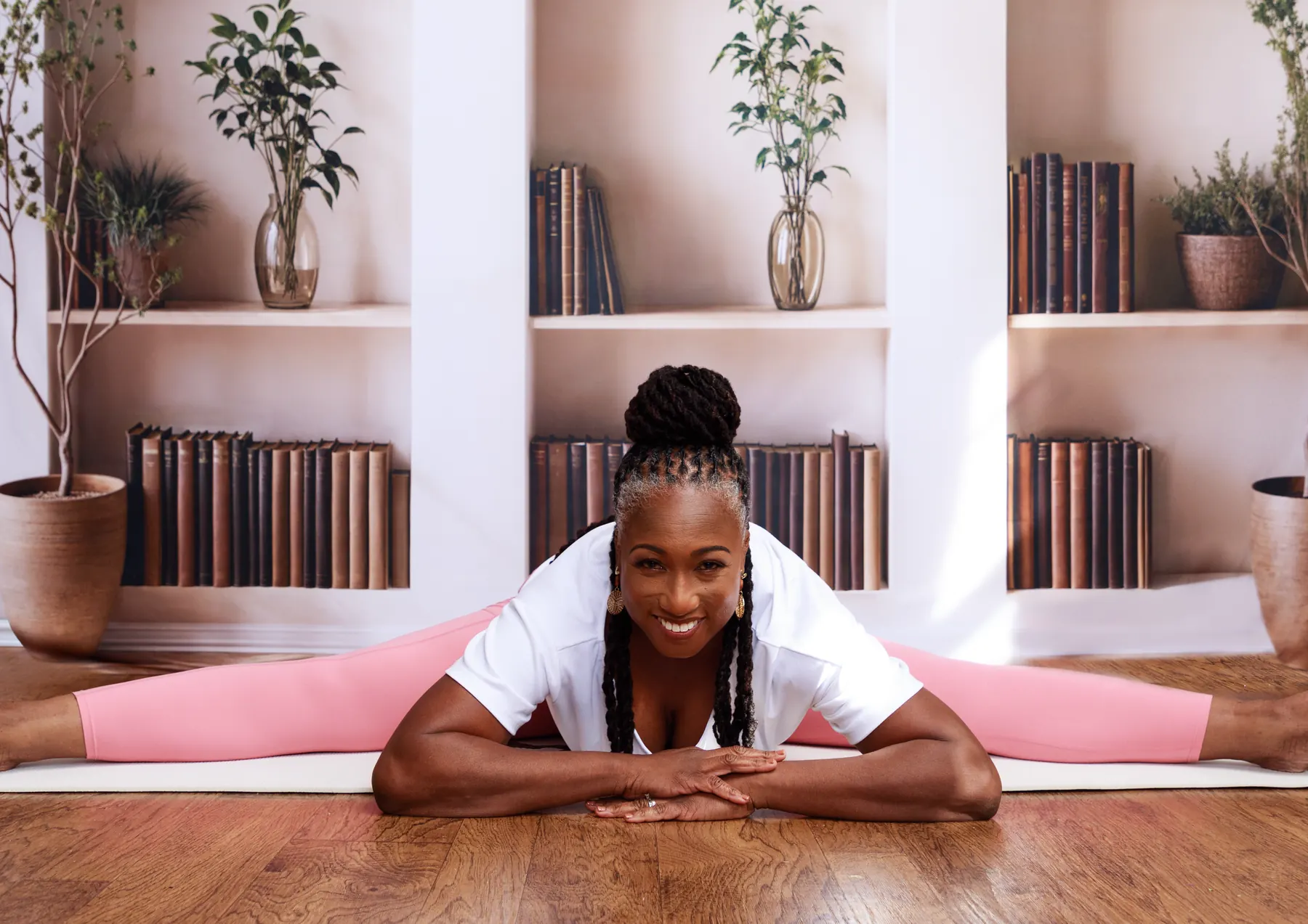 Dianne Adkins-Forte smiling in a floor split, Femme Flex