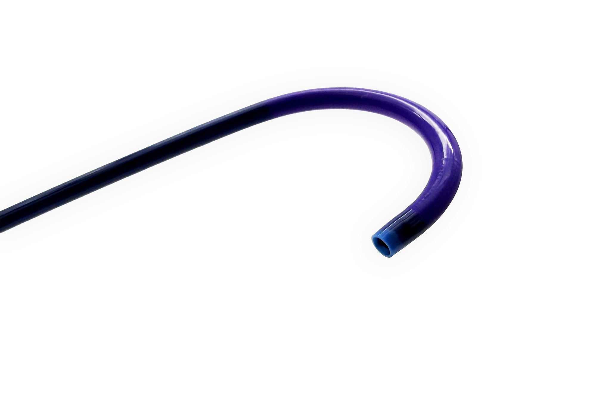 Steerable catheter with deflectable distal tip curved into a J-shape