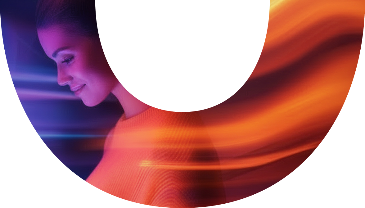 A smiling woman looking down
