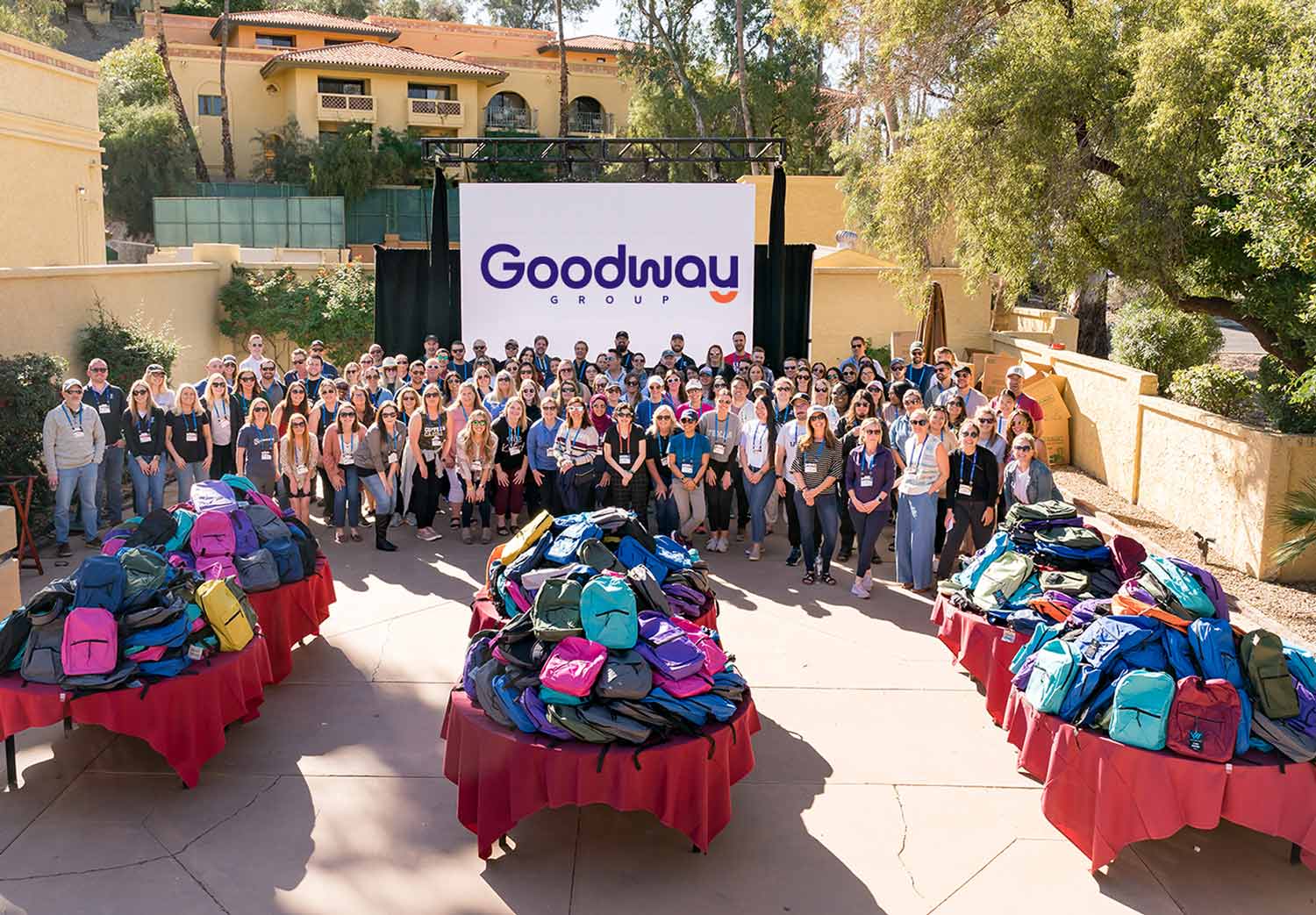 a group of Goodway employees cheering at a charity event
