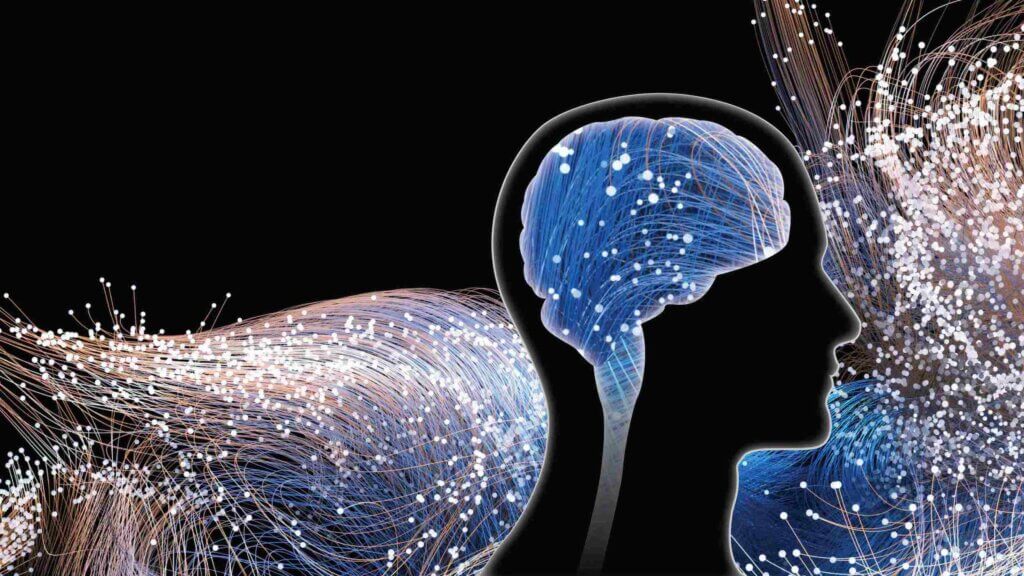 Human head silhouette with glowing blue brain and digital data flowing throughout.