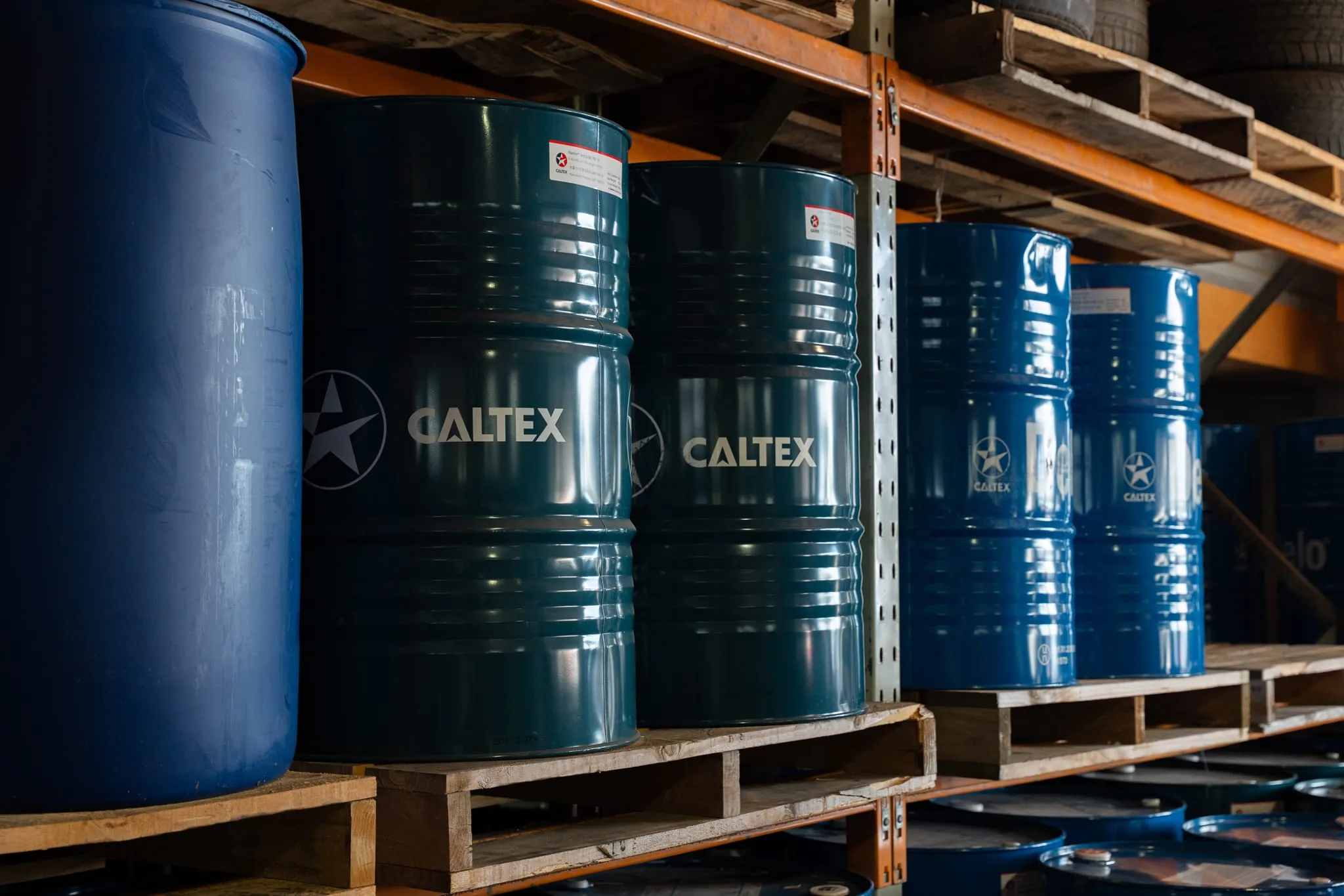 Barrels of Caltex oil in workshop