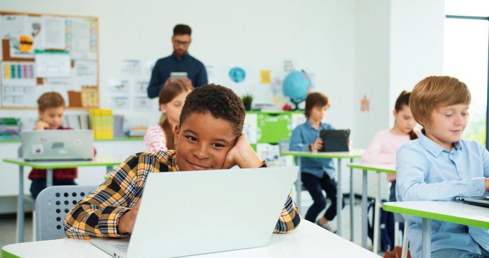 Are Literacy Programs for Elementary Schools Compatible with At-Home Reading Programs?