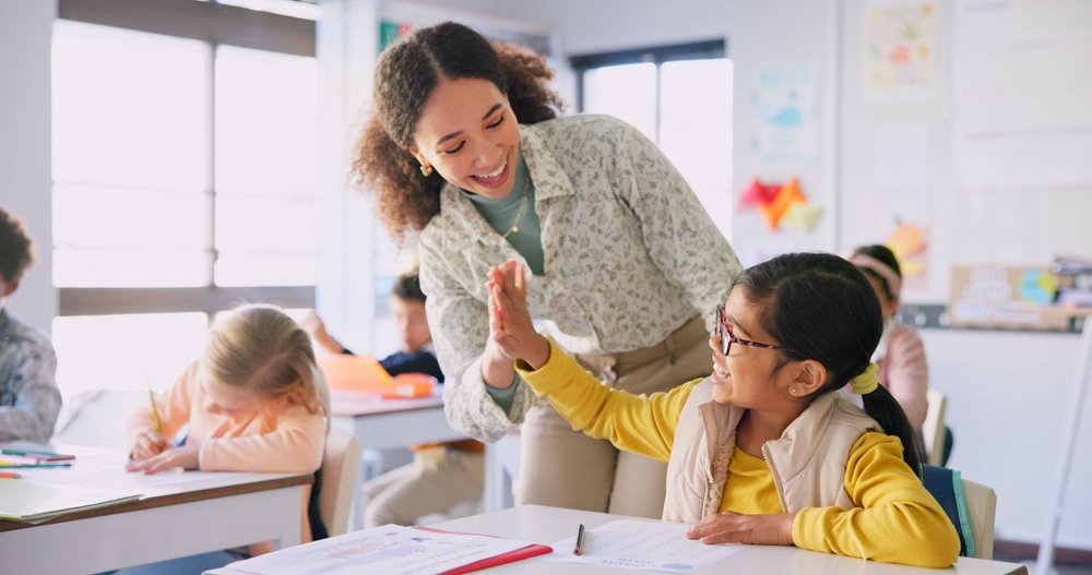 Teacher fostering writing skills among students