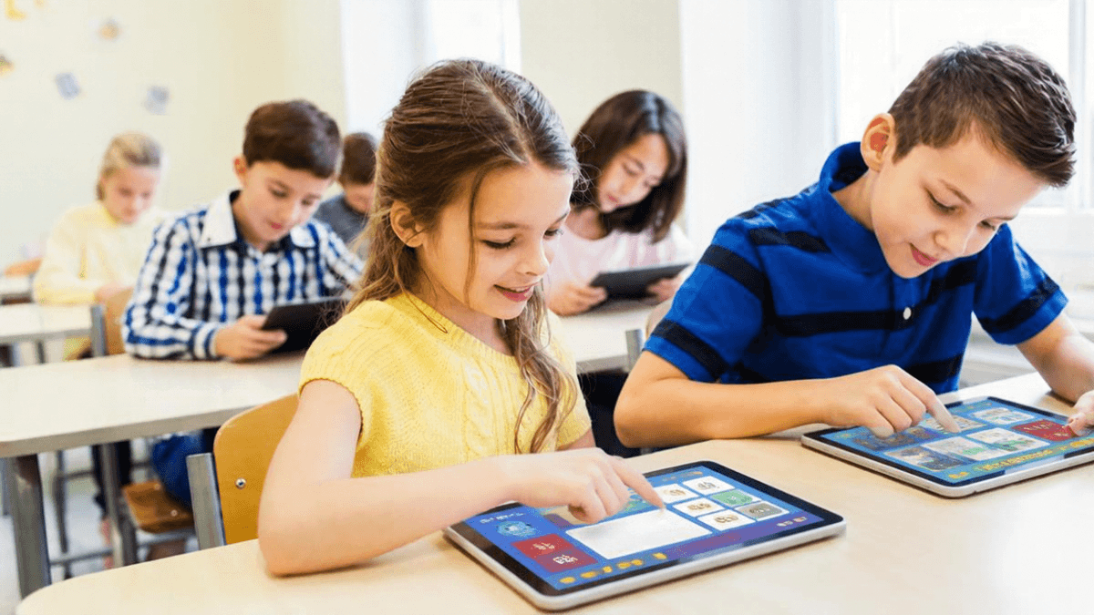 Kids exploring reading fluency apps on tablets