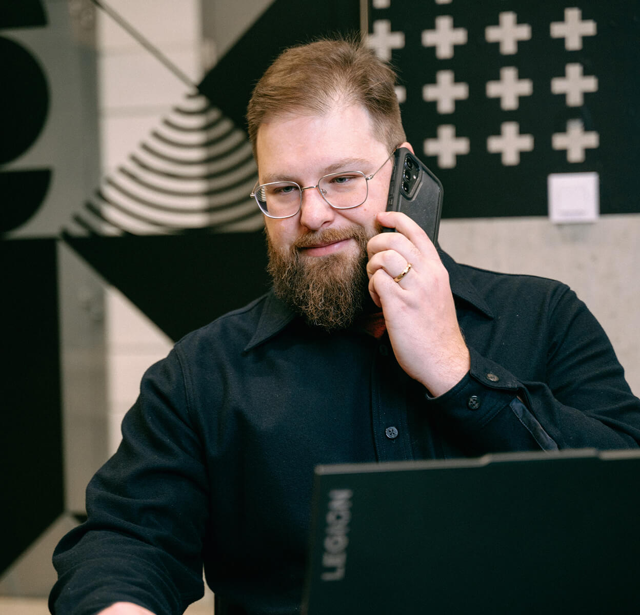 Miroslav Kriz talking on a smartphone