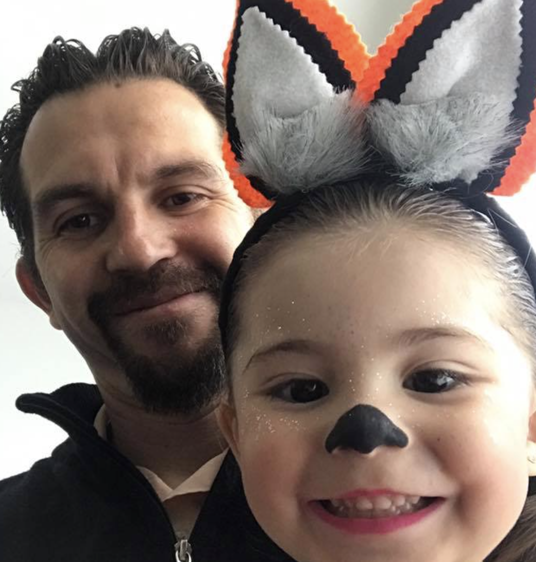 [headshot] image of satisfied student using a laptop