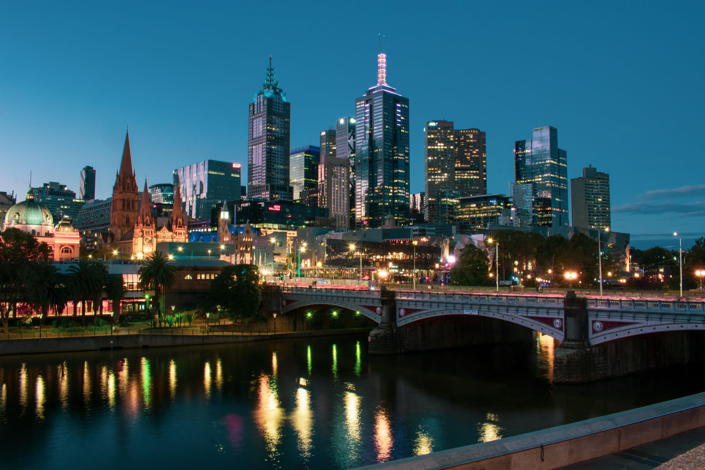 Melbourne city skyline at dusk, viewed across the Yarra River from Princes Bridge