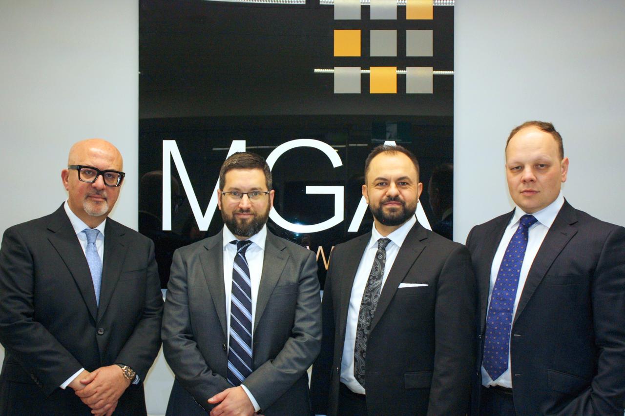 The MGA Lawyers leadership team, left to right: Mark Geremia, Hayden Forbes, Turgut Ozcitti and Marcin Szary