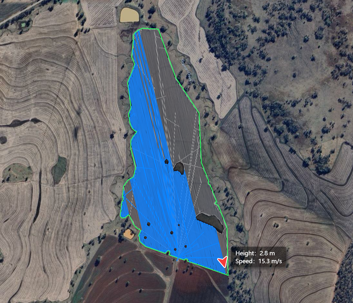 Construction workers wearing yellow helmets and blue uniforms climbing orange stairs against a clear blue sky.