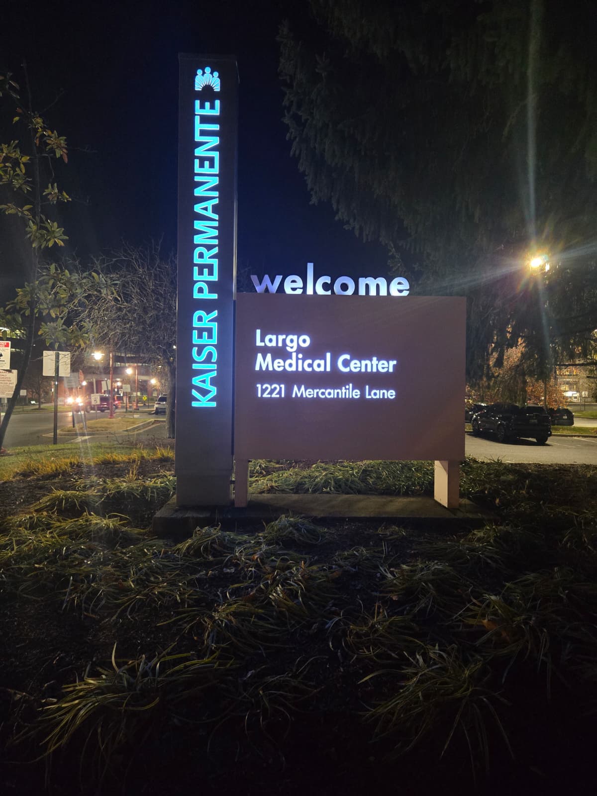 Illuminated night sign for Kaiser Permanente Largo Medical Center at 1221 Mercantile Lane.