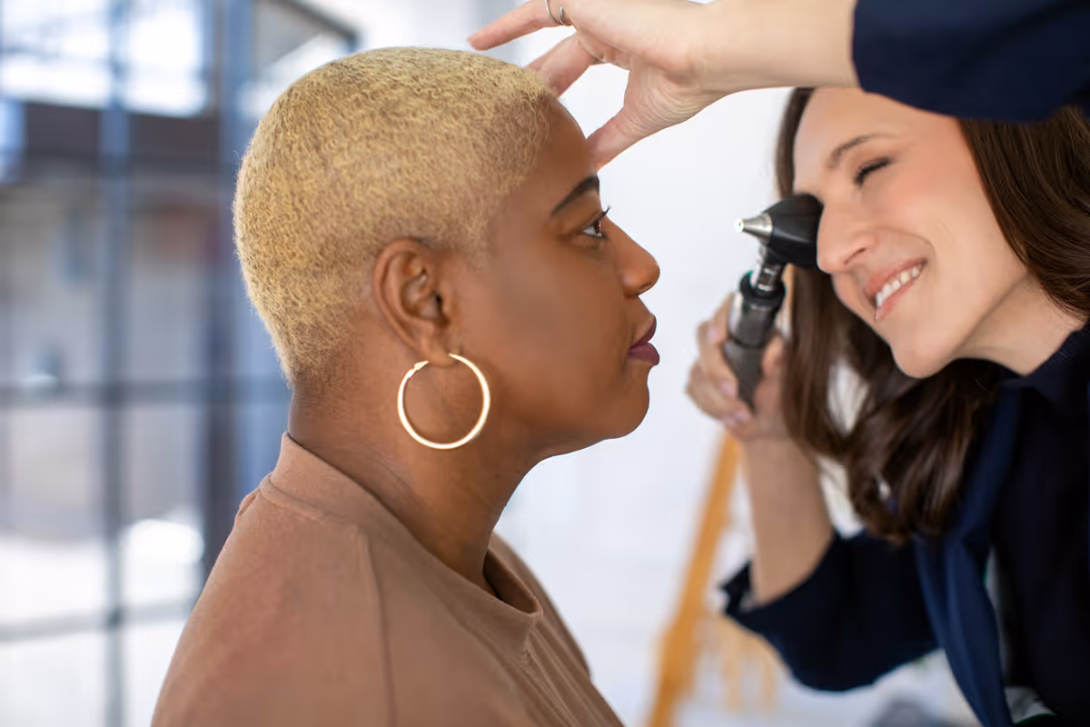 Dr. Sarah French checking eyes