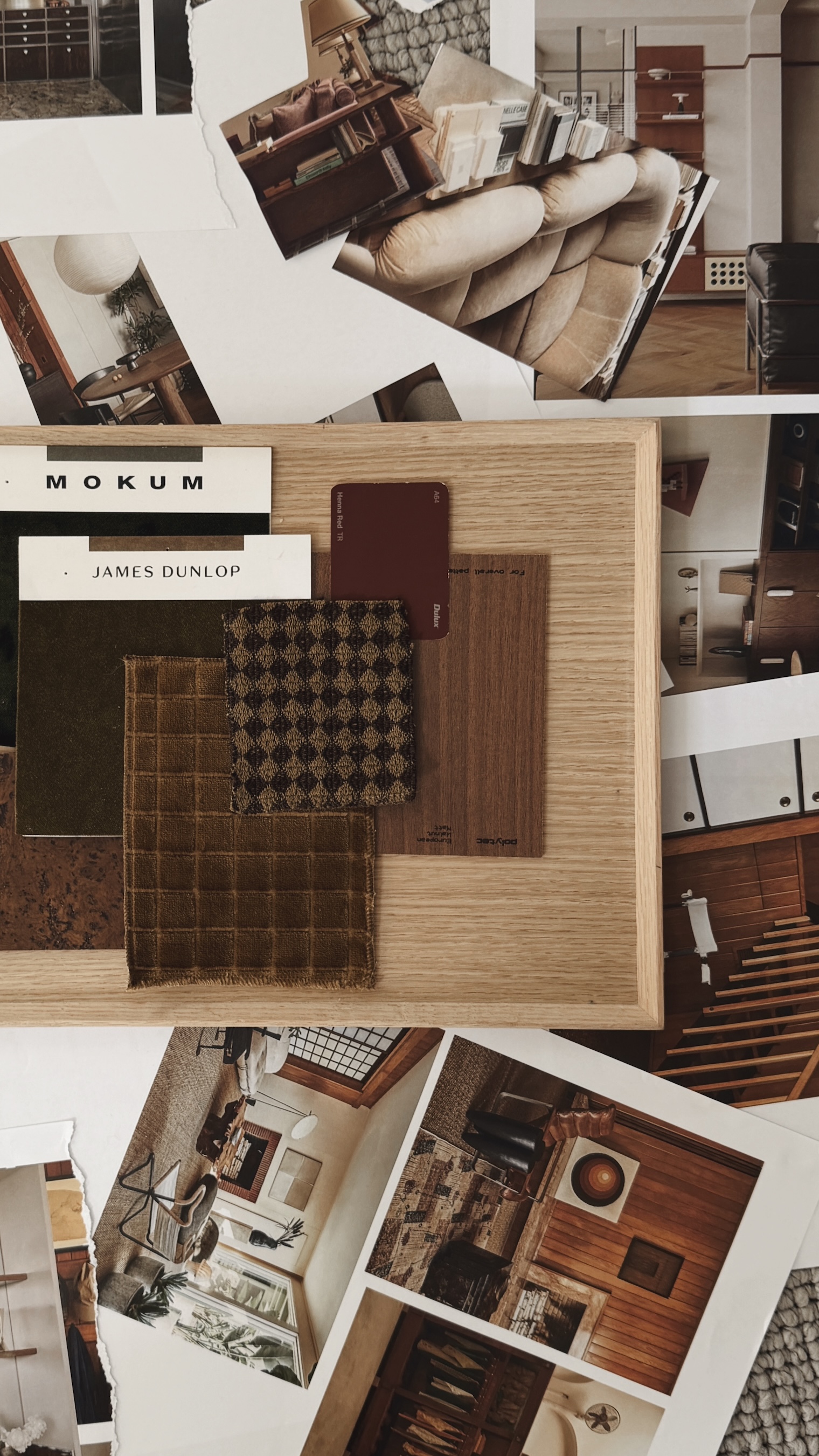 Wooden board with fabric swatches, paint samples, and interior design photo prints.