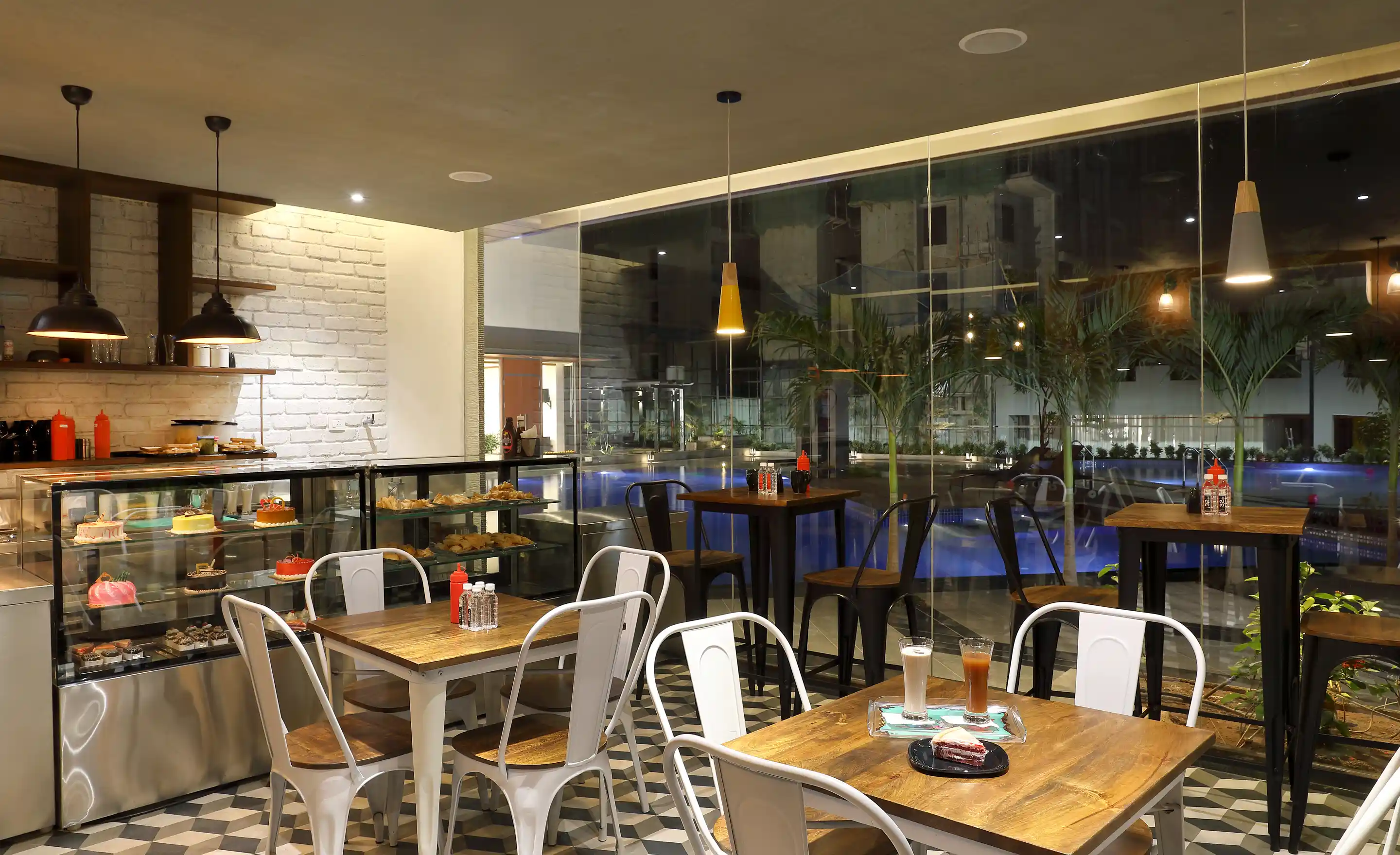 Bhandari 7 Plumeria Drive Pool Side Cafe Amenity Interior Tathwade, Pune 