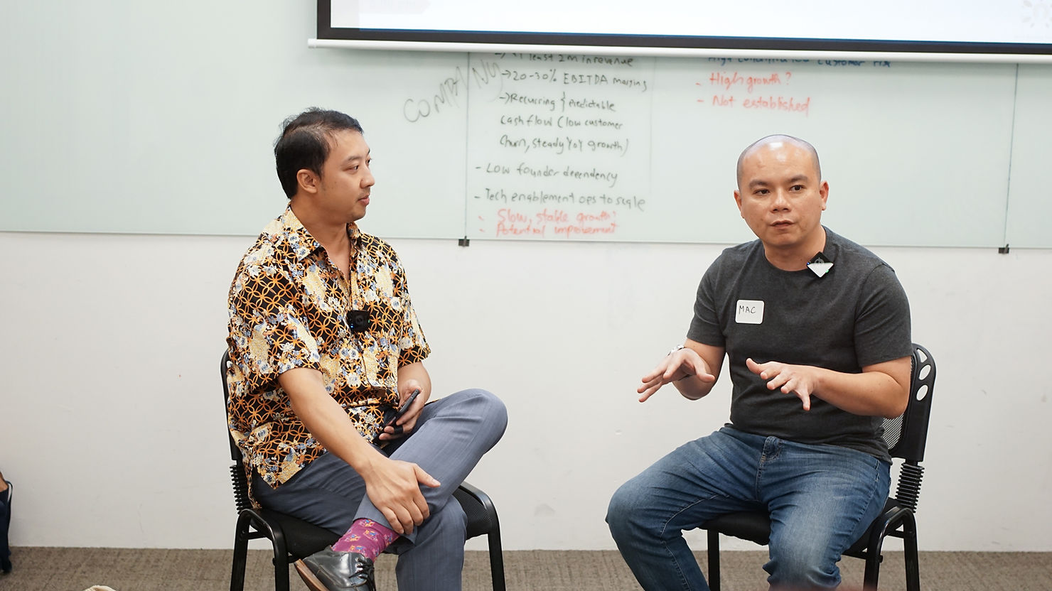 Our founder Andrew Tan having a fireside chat with Mac Ng, a broker for SME