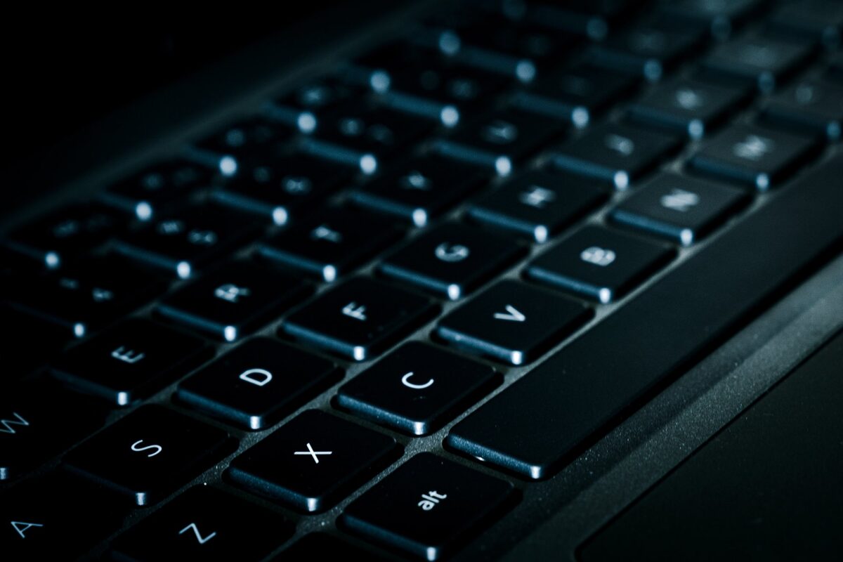 Close-up of a keyboard representing Atlassian Rovo Deep Research investigating company knowledge.