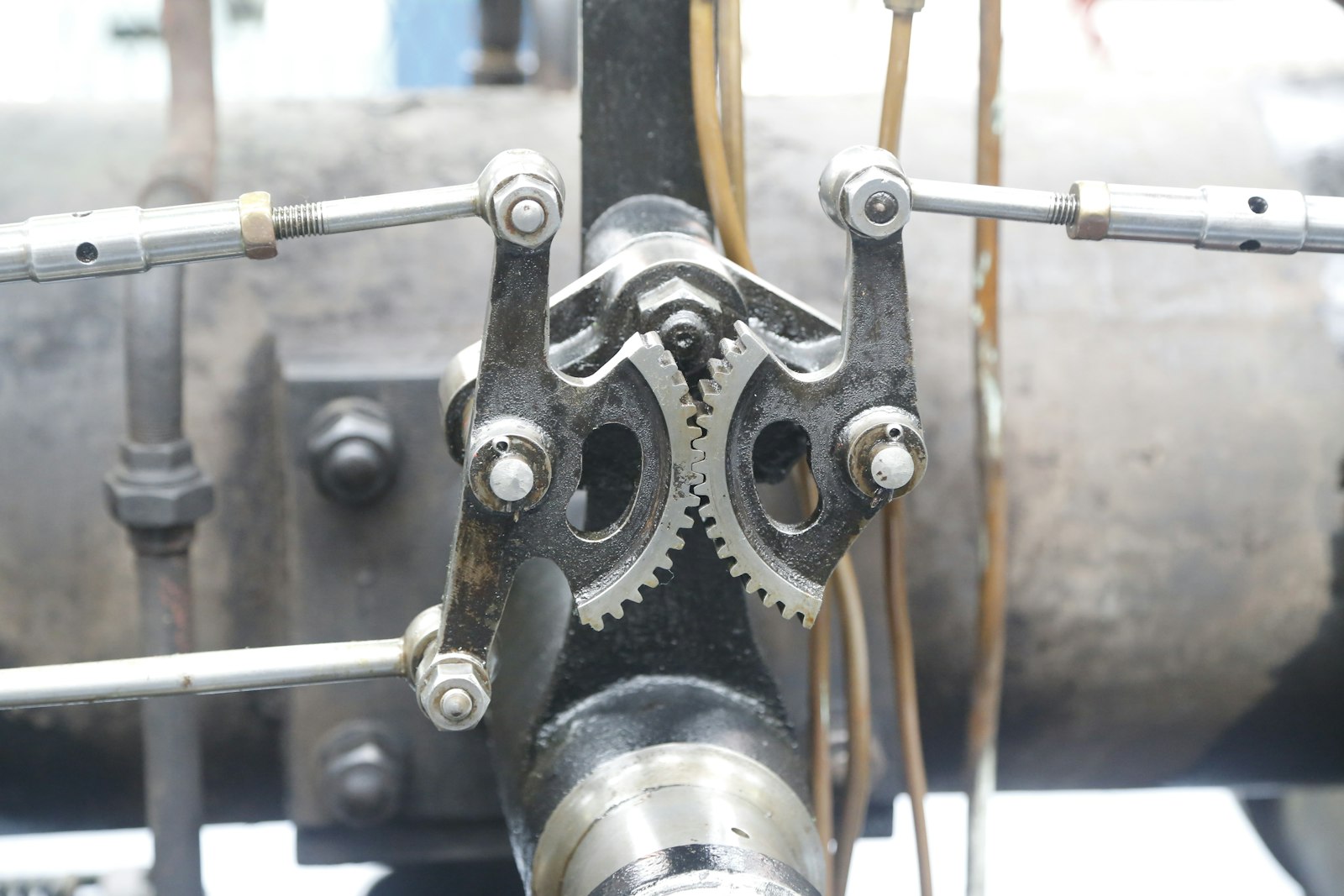 Close-up of interlocking gears on a vintage industrial machine