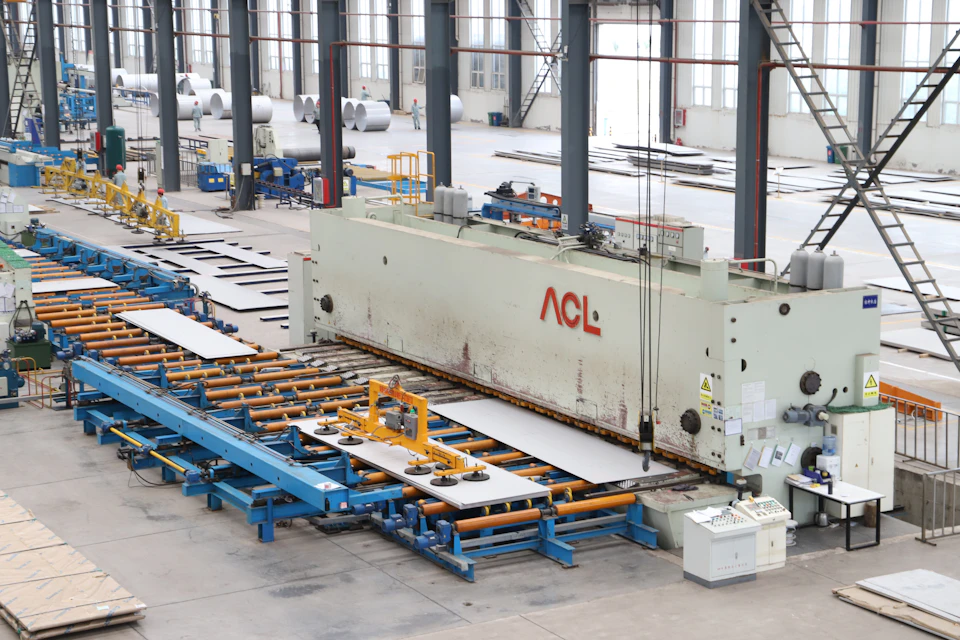 Production machinery inside a large manufacturing facility
